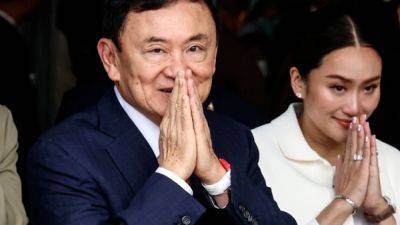 Former Thai PM Thaksin Shinawatra charged with royal insult