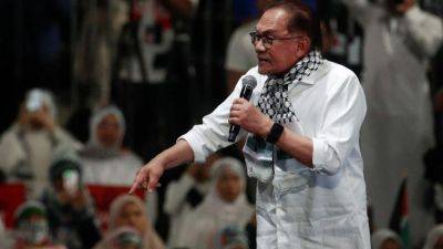 Malaysia’s PM Anwar Ibrahim makes ‘no apology’ for Hamas links on Germany visit