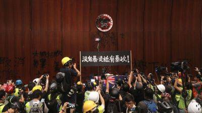 Hong Kong jails 12 people over the storming of the legislature in 2019 - edition.cnn.com - Hong Kong -  Hong Kong