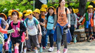 Japan schools face ‘major crisis’ if officials fail to cut teachers’ work hours, unions warn