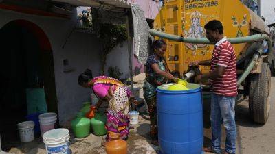 India’s Bengaluru is fast running out of water, and a long, scorching summer still looms - apnews.com - India