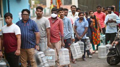 Taps dry up in India’s Bengaluru as it fast runs out of water: ‘we’re taking turns to do everything’