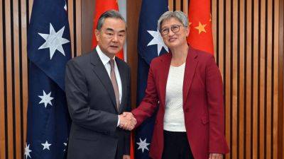 Wang Yi - Penny Wong - SuLin Tan - Australia, China should take ties ‘far’, Wang Yi says, as he urges more bilateral cooperation - scmp.com - China - Usa - Australia -  Canberra