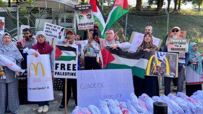 Hadi Azmi - Joseph Sipalan - McDonald’s Malaysia drops lawsuit against pro-Palestinian boycott group - scmp.com - Malaysia - Israel - Palestine -  Sanction -  Jerusalem - county Mcdonald