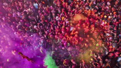 AP PHOTOS: India celebrates Holi, the Hindu festival of color, marking the reawakening of spring - apnews.com - India -  New Delhi - Nepal