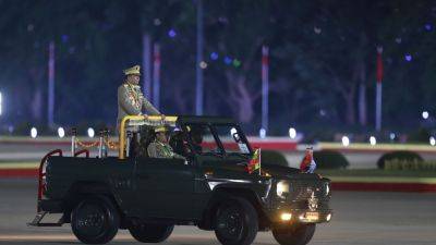 Myanmar’s military makes its annual parade of strength despite unprecedented battlefield losses