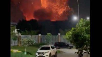 Reuters - In Indonesia, a massive blaze erupts at a military ammunition site, firefighters struggle to extinguish fire - scmp.com - Indonesia -  Jakarta