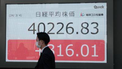 Japan's Nikkei closes above 40,000 after Wall Street benchmarks hit record highs; China ‘Two Sessions’ meeting in focus