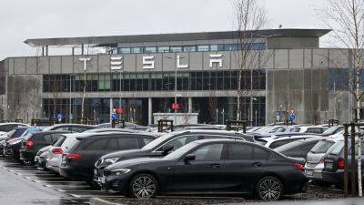 Karen Gilchrist - Reuters - Tesla's Berlin plant halts production after suspected arson attack at nearby substation - cnbc.com -  Berlin - Germany