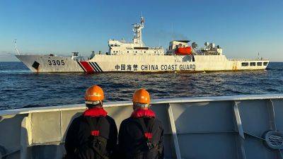 What it’s like on board an outnumbered Philippine ship facing down China’s push to dominate the South China Sea