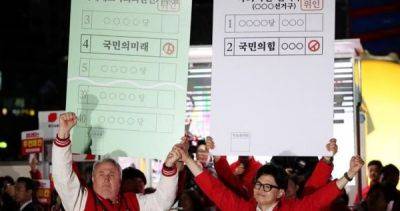 South Koreans vote for new parliament after economy, corruption dominate campaign