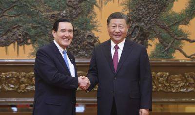 Taiwan’s Ma visits Xi, whose intentions he trusts