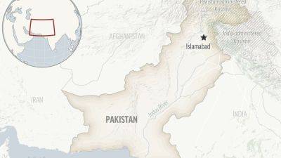 Pakistani police search for gunmen who abducted bus passengers and killed 10 in the southwest