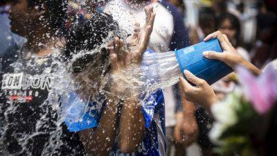 JINTAMAS SAKSORNCHAI - Water guns are in full blast to mark Thai New Year festivities despite worries about heat wave - apnews.com - Burma - Thailand - Cambodia - Vietnam - Laos