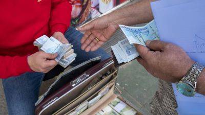Joe Biden - Ruxandra Iordache - Iranian currency plunges to record low against dollar after strikes on Israel - cnbc.com - Israel - Iran -  Tehran -  Damascus