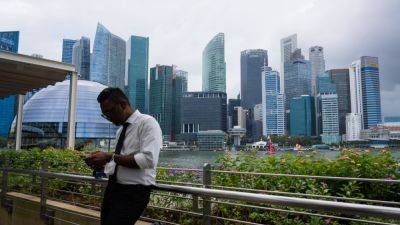 Asia markets mixed after Tuesday's broad sell-off; Singapore exports plunge more than expected
