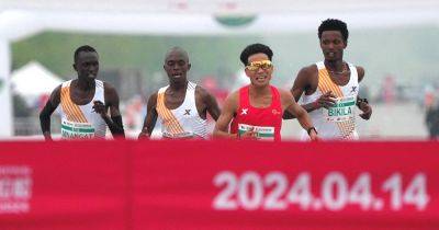 4 Disqualified from Beijing Race After 3 Let Chinese Runner Pass - nytimes.com - China -  Beijing - Kenya - Ethiopia