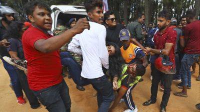 Associated Press - 7 dead, 20 injured after car veers off race track in Sri Lanka - scmp.com - Sri Lanka