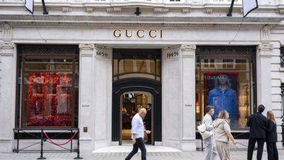 Karen Gilchrist - Kering shares sink 9% after profit warning on declining Gucci sales - cnbc.com - France - China