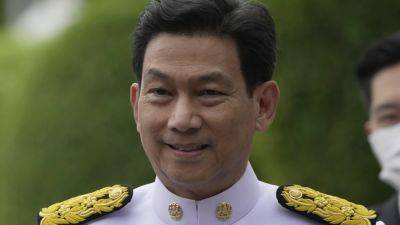 Thailand’s foreign minister abruptly resigns after being dropped as deputy prime minister