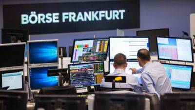 European markets close higher after euro zone inflation data surprises