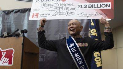 Associated Press - US$1.3 billion Powerball win draws attention to Laos’ ethnic group from China – the Iu Mien people - scmp.com - China - Usa - Thailand - state California - state Oregon - Laos