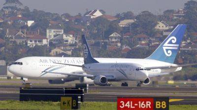 Airplane passenger fined in Sydney for urinating in a cup - apnews.com - New Zealand - Australia