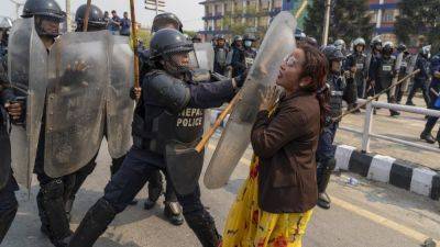Protesters demanding restoration of Nepal’s monarchy clash with police - apnews.com - Nepal -  Kathmandu, Nepal - state Hindu