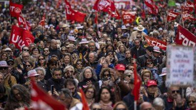 AP PHOTOS: Workers rule the streets on May Day