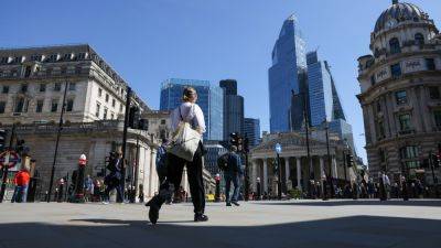 Europe stocks close at fresh record highs; UK exits recession