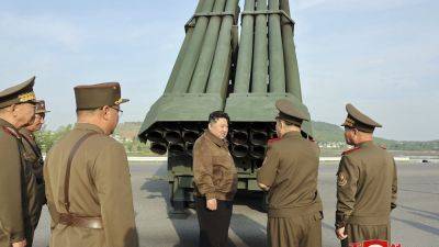 Kim Jong Un - News Agency - KIM TONGHYUNG - North Korean leader Kim supervises latest test of new multiple rocket launcher - apnews.com - Usa - Russia - South Korea - North Korea -  Seoul, South Korea - Guam - county Pacific