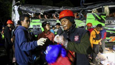 Associated Press - 11 killed, dozens injured in Indonesia after bus carrying students loses control, slams into traffic - scmp.com - Indonesia - city Jakarta