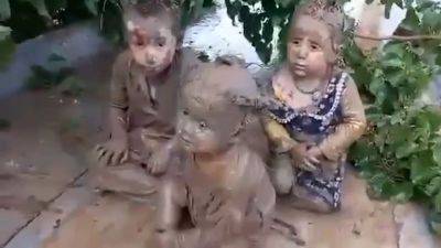 Afghanistan - Children pulled from mud as hundreds die in severe flooding in Afghanistan - edition.cnn.com - Afghanistan - province Baghlan
