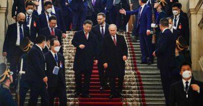 Xi Jinping - Emmanuel Macron - David Pierson - Vladimir V.Putin - Putin Will Visit Xi, Testing a ‘No Limits’ Partnership - nytimes.com - France - China - Usa - Russia - city Beijing - city Shanghai - Ukraine