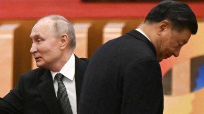 Xi Jinping - Vladimir Putin - Simone McCarthy - Putin to meet Xi in Beijing as world convulses from global conflicts - edition.cnn.com - China - Usa - Russia -  Beijing - Hong Kong - Israel -  Moscow - Washington - North Korea - Ukraine - Iran -  Pyongyang -  Tehran