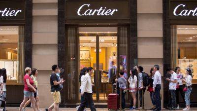 Shares of Cartier owner Richemont climb on record full-year sales, new CEO