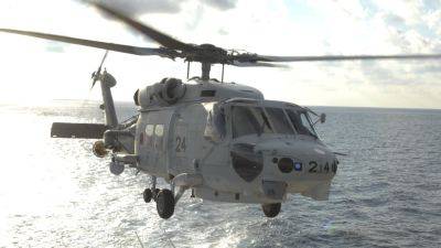 Minoru Kihara - MARI YAMAGUCHI - Japan says a collision during a nighttime drill caused the deadly April crash of 2 navy helicopters - apnews.com - Japan -  Tokyo - county Pacific