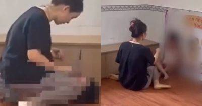 Teacher in Vietnam under fire for sitting on toddler, smacking and forcing him to eat oranges