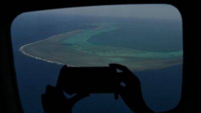 Jonathan Malaya - Jay Tarriela - Reuters - South China Sea: Philippines calls for Beijing to prove Scarborough Shoal is undamaged - scmp.com - China - Philippines -  Beijing -  Manila