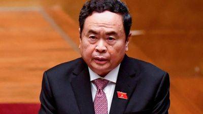Agence FrancePresse - Reuters - Nguyen Khac Giang - Dinh Hue - Vietnam parliament elects Tran Thanh Man new chairman amid leadership reshuffle - scmp.com - Singapore - Vietnam -  Singapore - county Delta