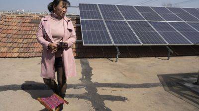 Corn, millet and ... rooftop solar? Farm family’s newest crop shows China’s solar ascendancy