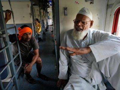 Narendra Modi - Train of thought: India voters dissect Modi’s politics during long journey - aljazeera.com - India -  New Delhi