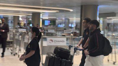 Most of passengers from battered Singapore Airlines jetliner arrive in Singapore from Bangkok