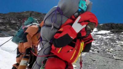 Nepal’s ‘Everest man’ reaches peak for record 30th time