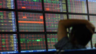 Asia markets rise on data-heavy day