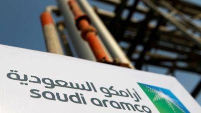 Natasha Turak - Saudi Aramco upholds dividend despite drop in first-quarter profits - cnbc.com - Saudi Arabia