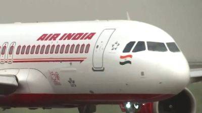 Bloomberg - Tata Group’s Air India Express airline, cancels at least 20 flights as cabin crew call in sick en masse - scmp.com - Russia - India - Singapore -  Singapore