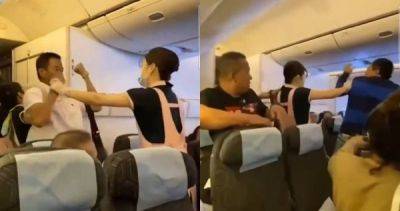 Eva Air stewardesses lauded for bravery after breaking up mid-air scuffle between 2 men