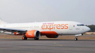 Bloomberg - Agence FrancePresse - Air India Express flights disrupted for second day as cabin crew call in sick in revolt over merger - scmp.com - India