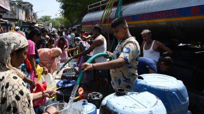 In pictures: India records 'longest' heatwave, Delhi faces water crisis